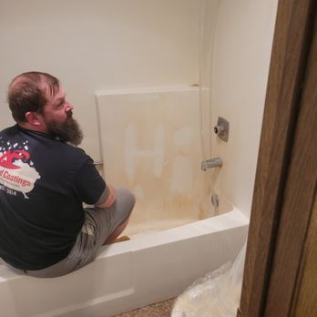 Refinishing coating being applied
